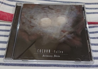 Schwarz Stein / COCOON-Fallen-