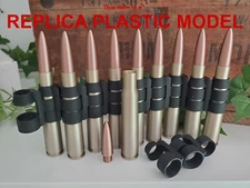 25 - FAKE .50 Cal BMG Linked Ammunition - Plastic Replica