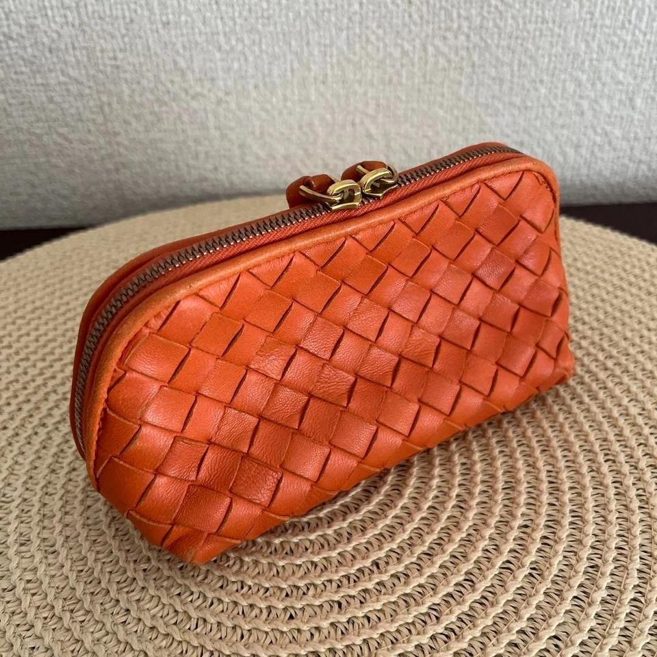 Bolsa Bottega Veneta Intrecciato en Hermes Naranja con Cremallera Dorada. Foto 2 de 4