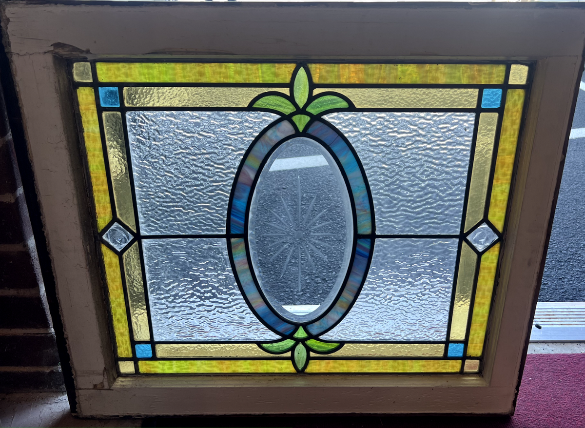 Early 20th century starburst bevel stained glass window. 25