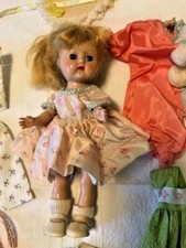 Vintage 1950's Cosmopolitan GINGER doll with outfits .