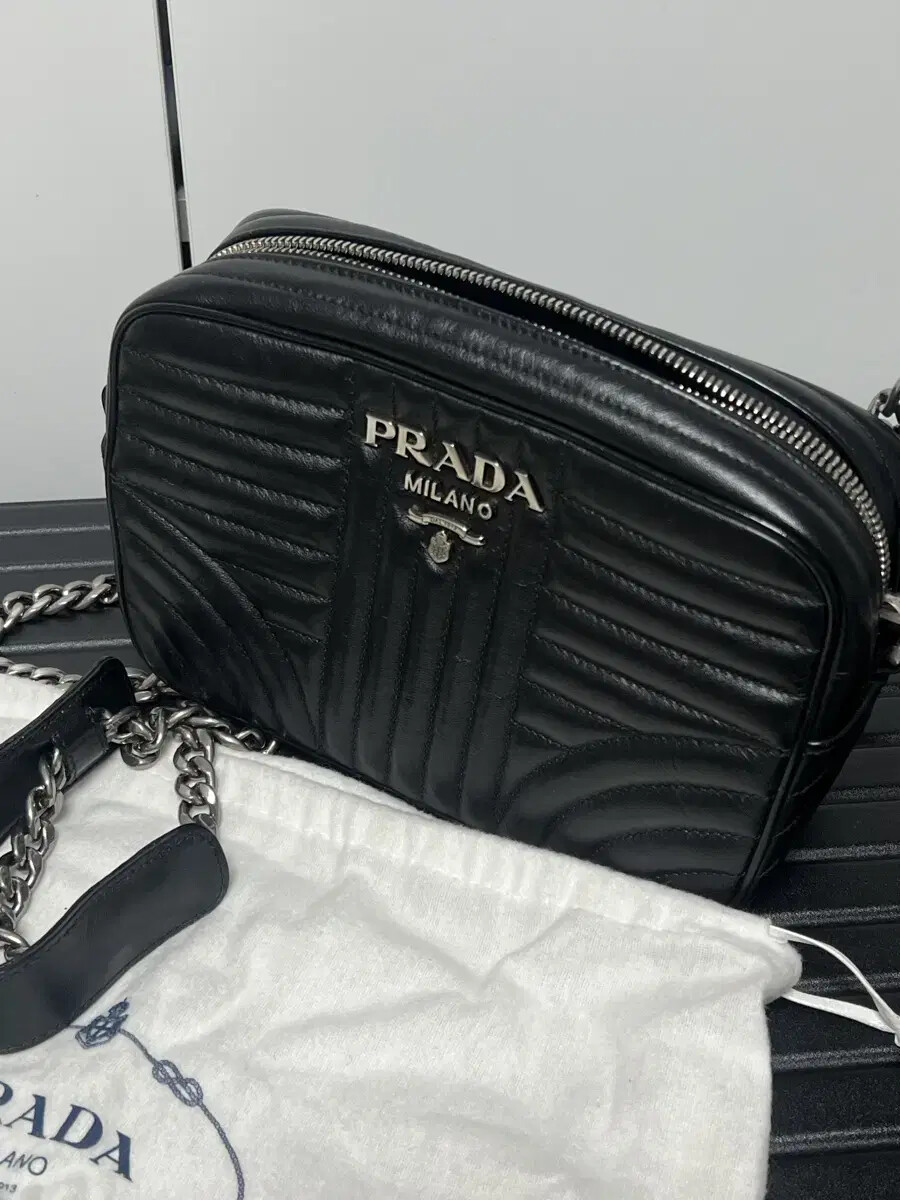 Prada Diagram soft leather crossbody bag with adjustable strap