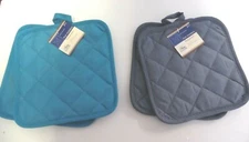 POTHOLDERS.. SET OF 2.. 100% POLYESTER...7" X 7 "