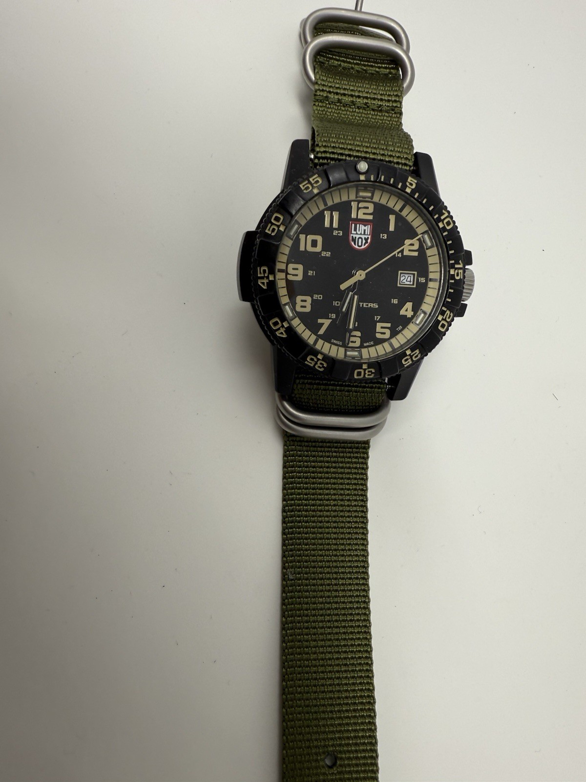 Quartz analog watch model number: 0320-1GBQ H-3 LX LUMINOX - Preowned