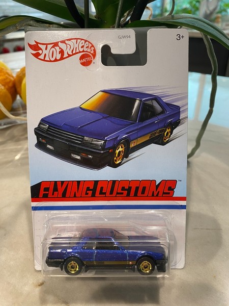 Hot Wheels Target Retro Flying Customs Nissan Skyline Rs (KDR30) Blau 1:64-image