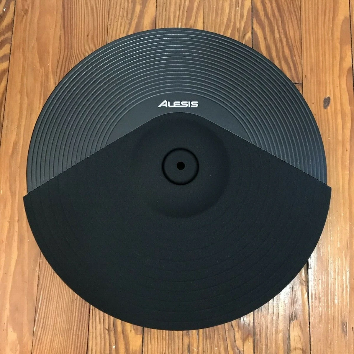 Dual zone cymbal outlet