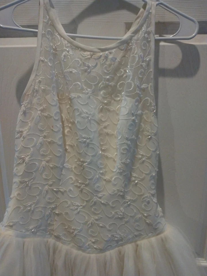 Vestido de novia jazmín sin mangas de tul talla 8 marfil en color dañado Foto 3 de 4