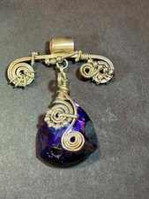 Absolutely unique handmade, wire-wrapped purple glass pendant