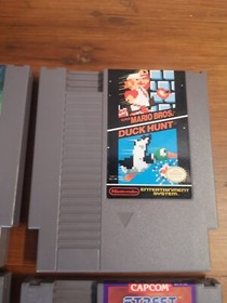 4 LOT NES games Dragon Warrior Muppet Adventure Street Fighter Mario/Duck Hunt