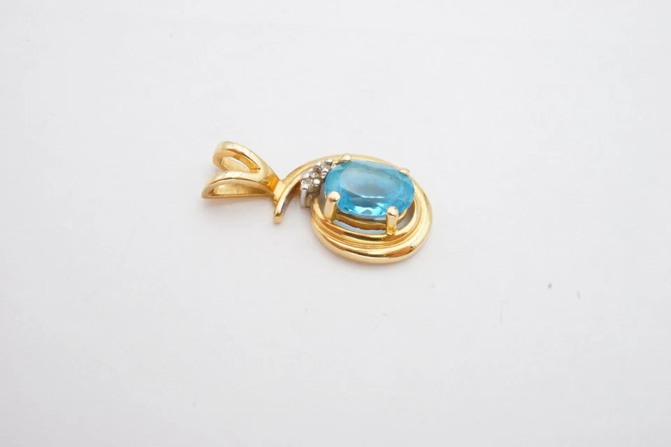 Alwand Vahan 14k Yellow Gold 1.25 Carat Blue Topaz And Diamond Swirl Pendant - Image 4 of 4