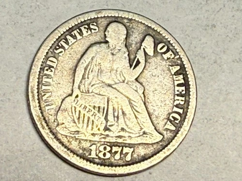 1877-CC Carson City SEATED LIBERTY silver dime. VG-Fine, reverse scuffs. #nr1