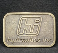 WF03146 COOL VINTAGE 1970s HYDRAULICS, INC. ADVERTISEMENT BRASS BELT BUCKLE