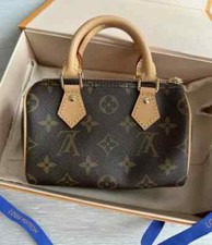Louis Vuitton Speedy Bandouliere White Strap Duffle Nano Brown Canvas