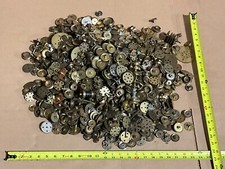32 POUNDS 1300 PIECES OF GILBERT ERECTOR BRASS PULLY, GEAR, DISC, WHEELS USED