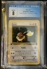 2000 Pokemon Team Rocket 1st Edition Eevee #55 - CGC 8 NM/Mint
