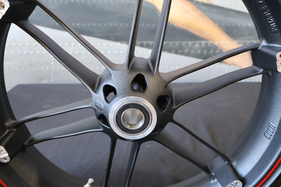 G0110.02A8BYDC NEW OEM 2003-2010 BUELL XB1125R/CR FRONT WHEEL PIRANHA BLACK - Image 3 of 4