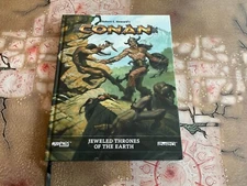 Robert E. Howard's CONAN:  Jeweled Thrones of the Earth  2d20 rpg Modiphius HC