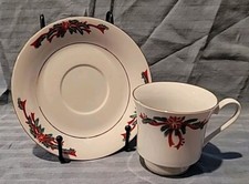 TIENSHAN FINE CHINA POINSETTIA RIBBON Footed Cup  Saucer