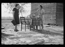 Rehabilitation borrower showing lace work she has made to home sup - Old Photo