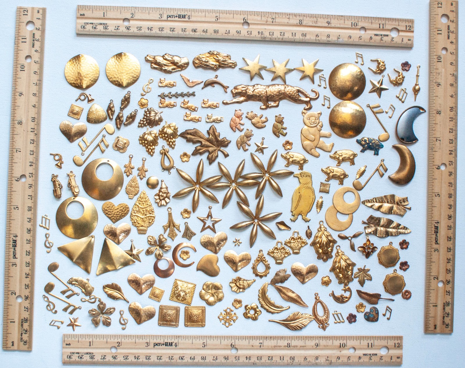 Lot 164  1/2 lb (151 pcs) VINTAGE BRASS STAMPINGS, Prowling Leopard