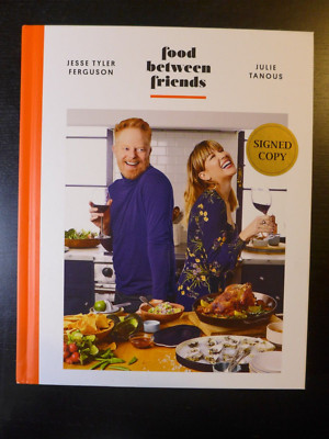 JESSE TYLER FERGUSON/JULIE TANOUS-AUTOGRAPHED ''FOOD BETWEEN FRIENDS'' SIGNED BOOK