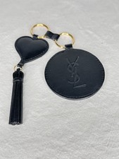 porte clés miroir de sac Yves Saint Laurent cuir noir très bon état 