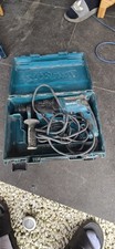 Makita rotary hammer drill in a carrying case,  model HR2630