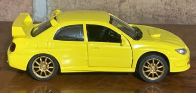 Subaru Impreza WRX STi 2006 YELLOW SAICO BRAND NEW 1:32 SCALE 