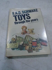 F.A.O  SCHWARZ TOYS THROUGH THE YEARS  BOOK   TOY COLLECTING VINTAGE TOYS 