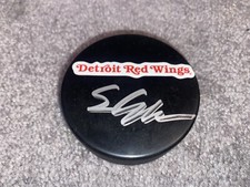 SIMON EDVINSSON SIGNED DETROIT REDWINGS RED WINGS WORD LOGO HOCKEY PUCK COA