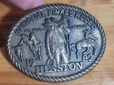 VINTAGE RODEO BELT BUCKLE 1982 HESSTON NATIONAL FINALS ALL AROUND COWBOY