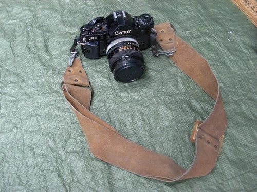 Canon A-1 35mm SLR Film Camera with 50mm Lens, leather strap