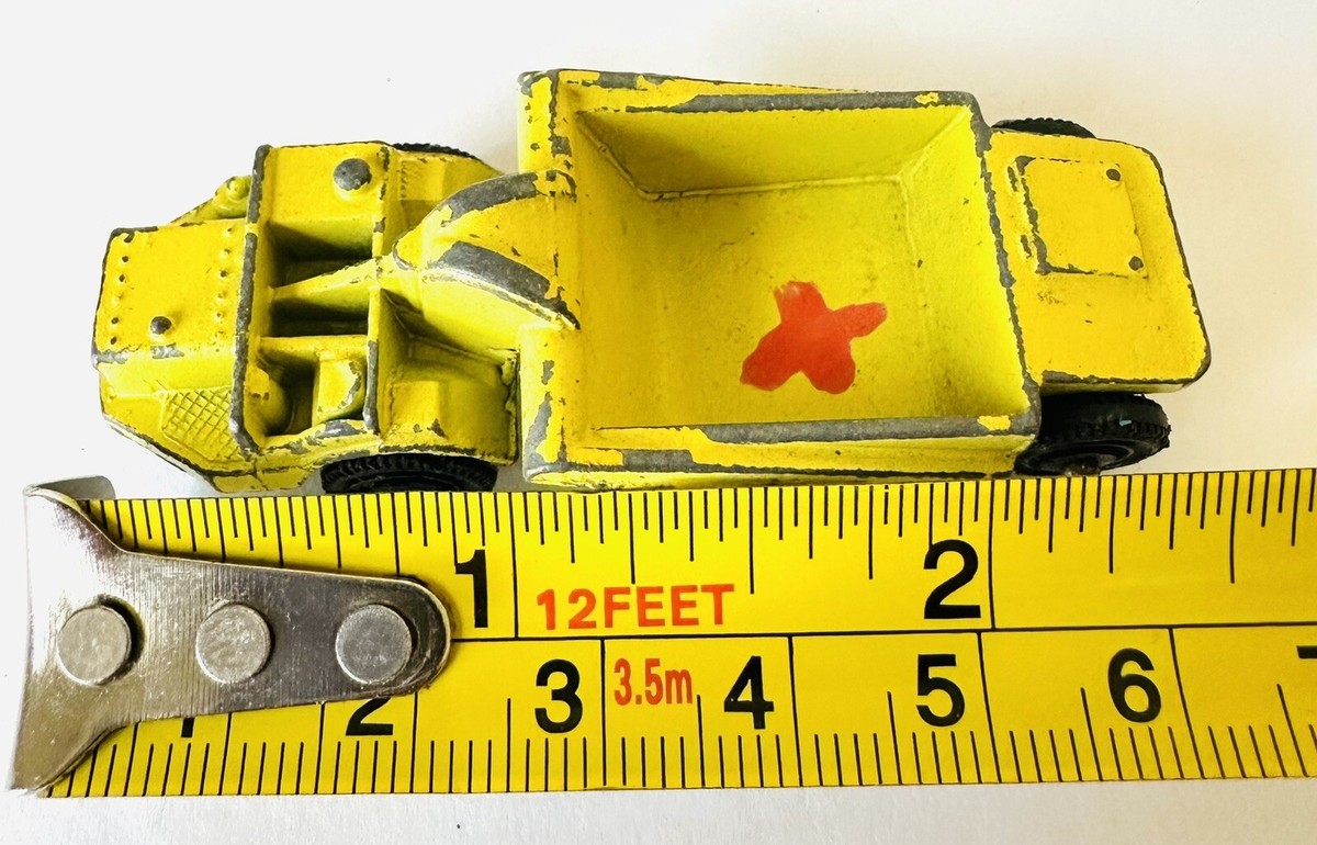 Vintage 1960s TootsieToy Earth Mover/Scraper in Yellow made Vintage 1960s TootsieToy Earth Mover/Scraper in Yellow made