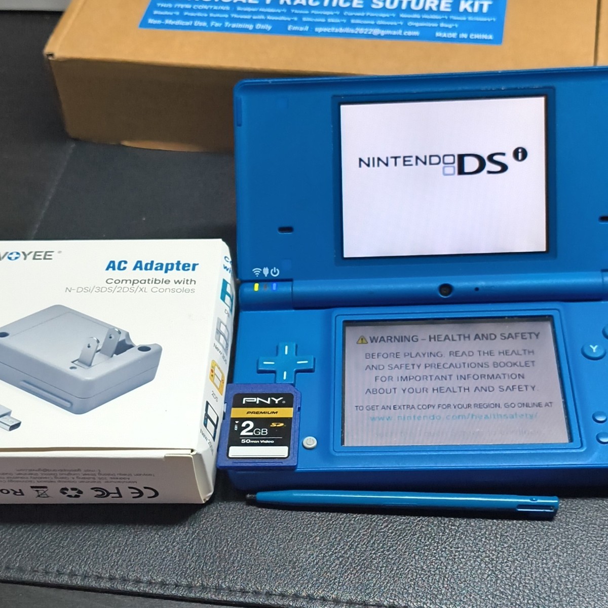 Nintendo DSi Blue Handheld Console w/ Stylus, 2GB SD Card & New