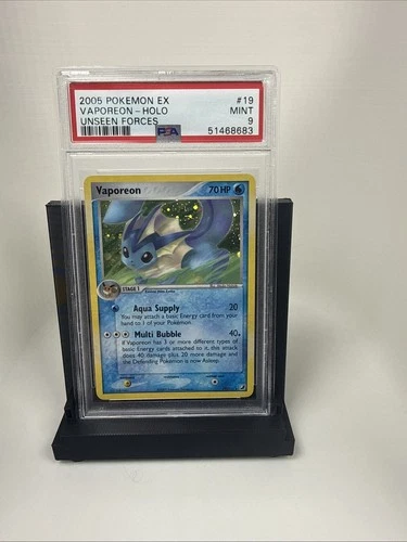 Pokémon Vaporeon 19/115 Unseen Forces Holo PSA 9