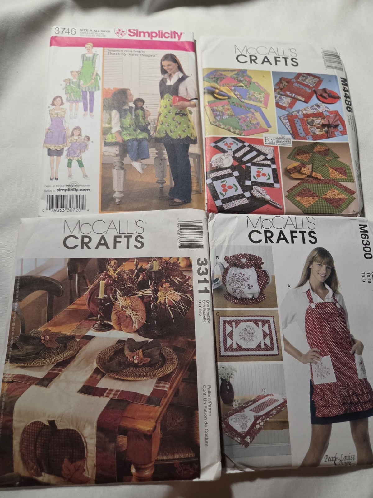 Lot of 4 Apron Placemats Tablewear UNCUT Sewing Patterns Simplicity McCall's 