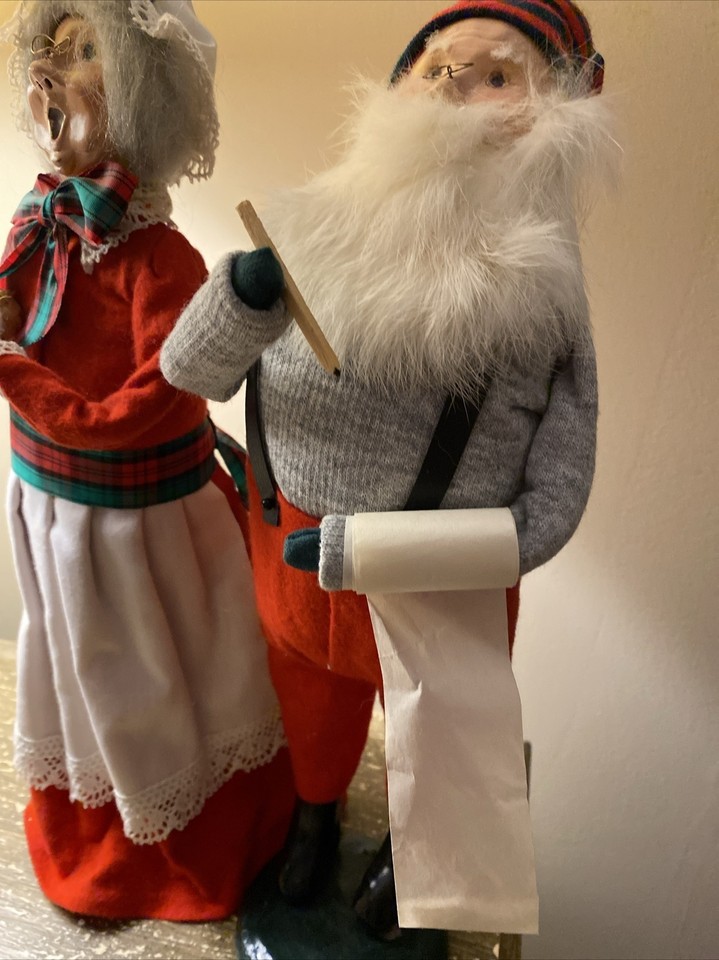 Premium Photo | A miniature santa claus statue