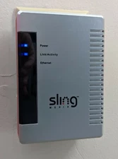 Sling Media SlingLink PART# SL100-100  PowerLine Ethernet Bridge powers ON 