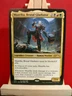 Maarika, Brutal Gladiator - Universes Within Promo - Rare - NM - MTG