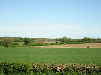Photo A2 Over  fields  to  Field  House  Farm South Newbald  c2015