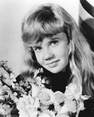 Hayley Mills lovely 1961 portrait posing next to flowers 16x20 poster