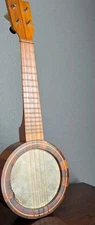 Vtg banjo ukulele banjolele 4 string laminated wood rim hide head bakelite Pegs