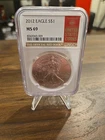 2012 1 Oz Silver American Eagle. In "RARE" NGC Honoring Red Book Slab. MS69.