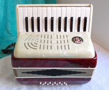 Noble Accordion 12 bass 25 Piano keys Red and White accordian Good used Cond.