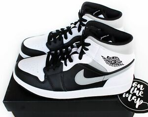 grey white and black jordan 1