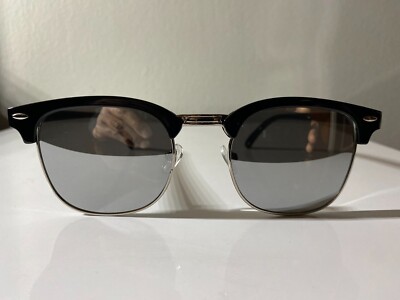 Classic 60's style men's sunglasses with black frame and reflective gray lenses
