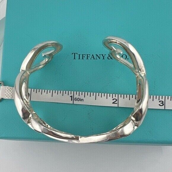 Tiffany & Co. Paloma Picasso Sterling Silver Loving Hearts Bangle