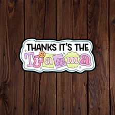 Mental health awareness sticker vinyl decal thanks it's the trauma smile face