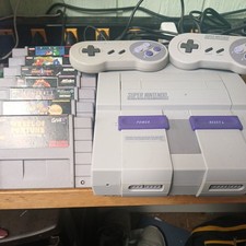 Super Nintendo Console Bundle with 2 Controllers and 7 Games