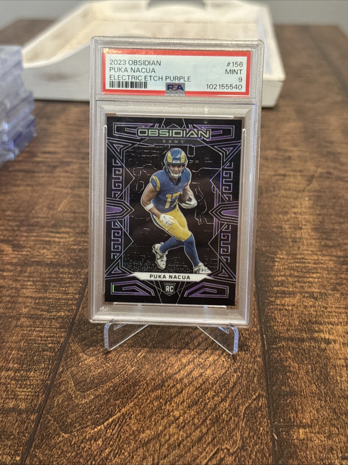 2023 Panini Obsidian - Puka Nacua #156 Electric Etch Purple /75 (RC)